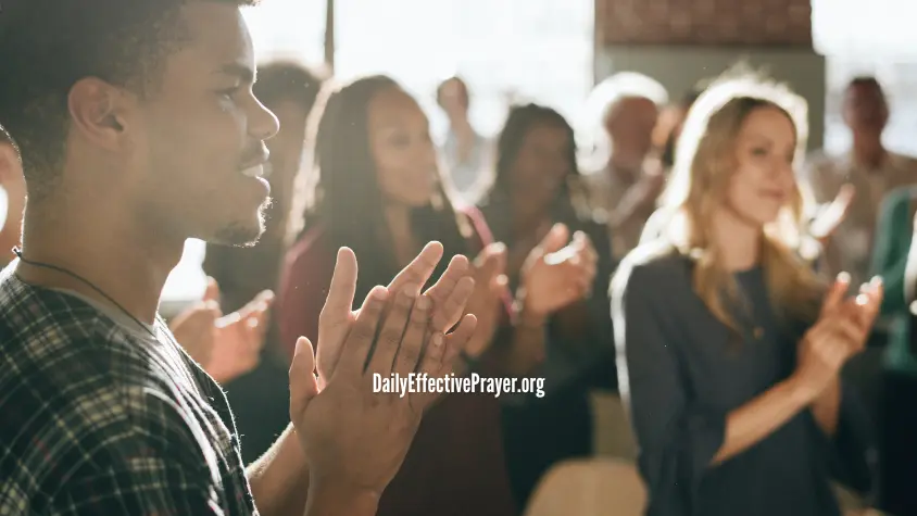 A group says an intercessory prayer for their pastor.